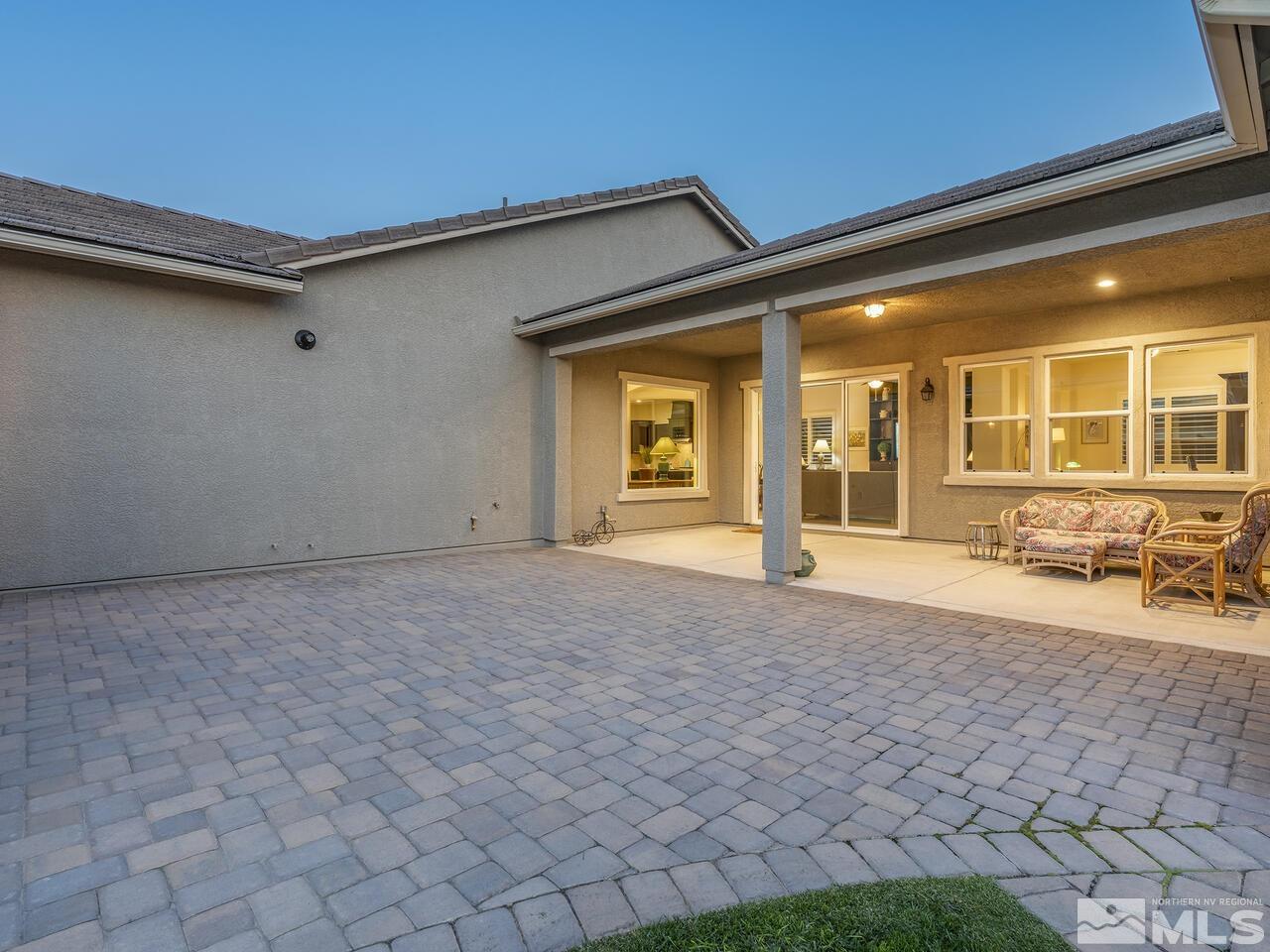 9583 Gazala Lane Reno, NV 89521 - Photo 27 of 36 a view of a house with backyard and sitting area