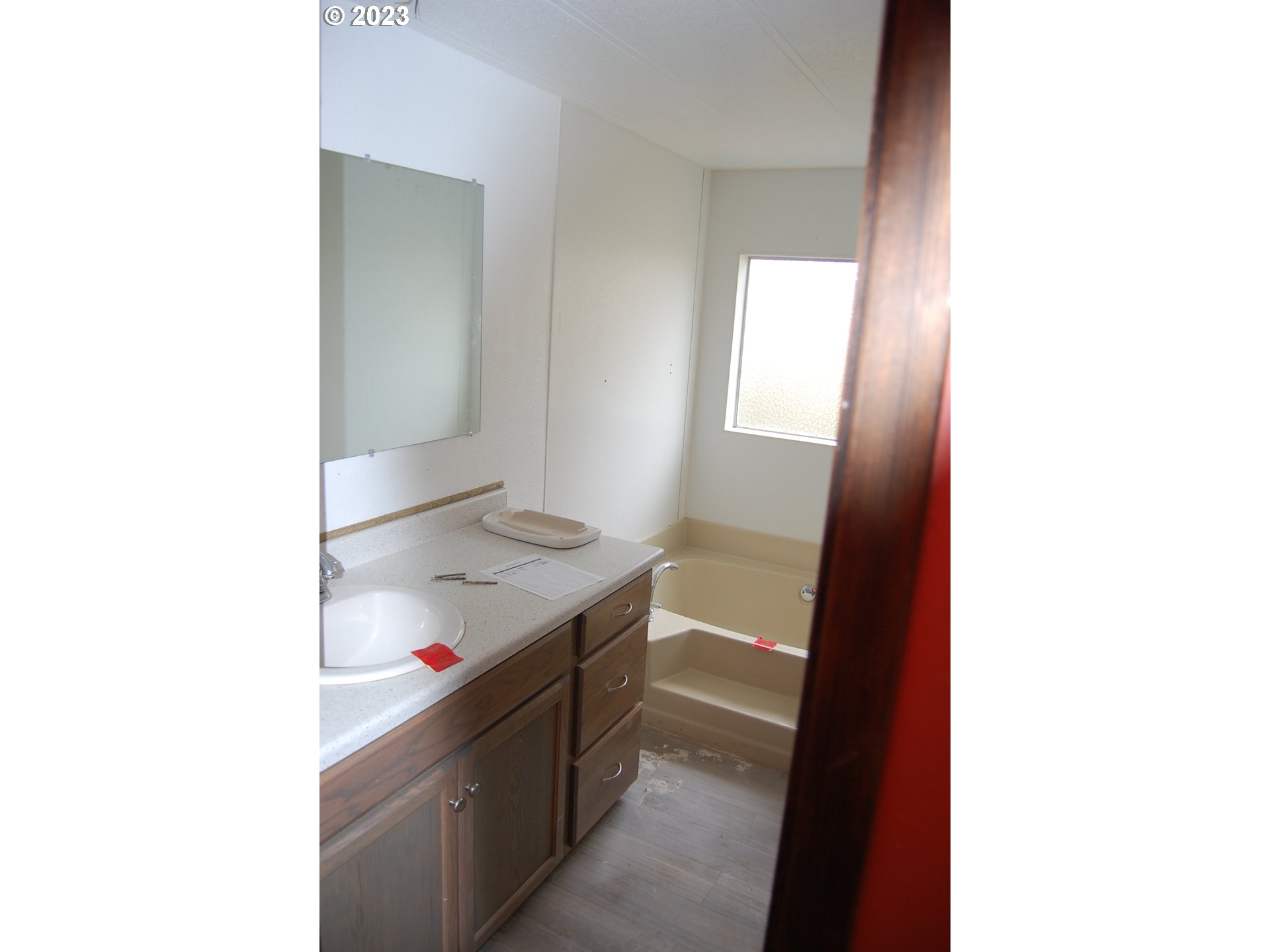 8850 Red Prairie Road Sheridan, OR 97378 - Photo 15 of 26 a room with a sink and a mirror