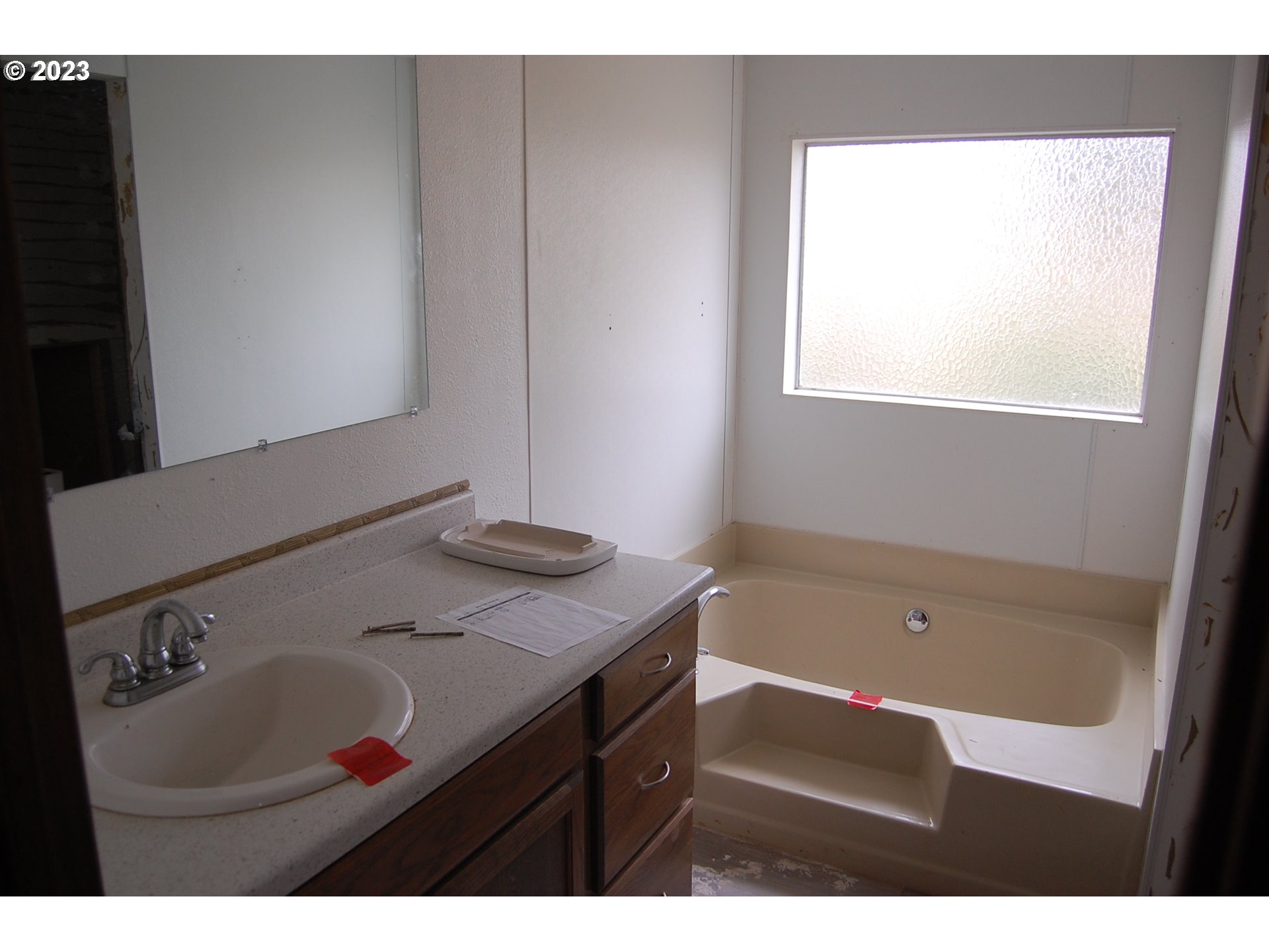 8850 Red Prairie Road Sheridan, OR 97378 - Photo 16 of 26 a bathroom with a sink and a bathtub
