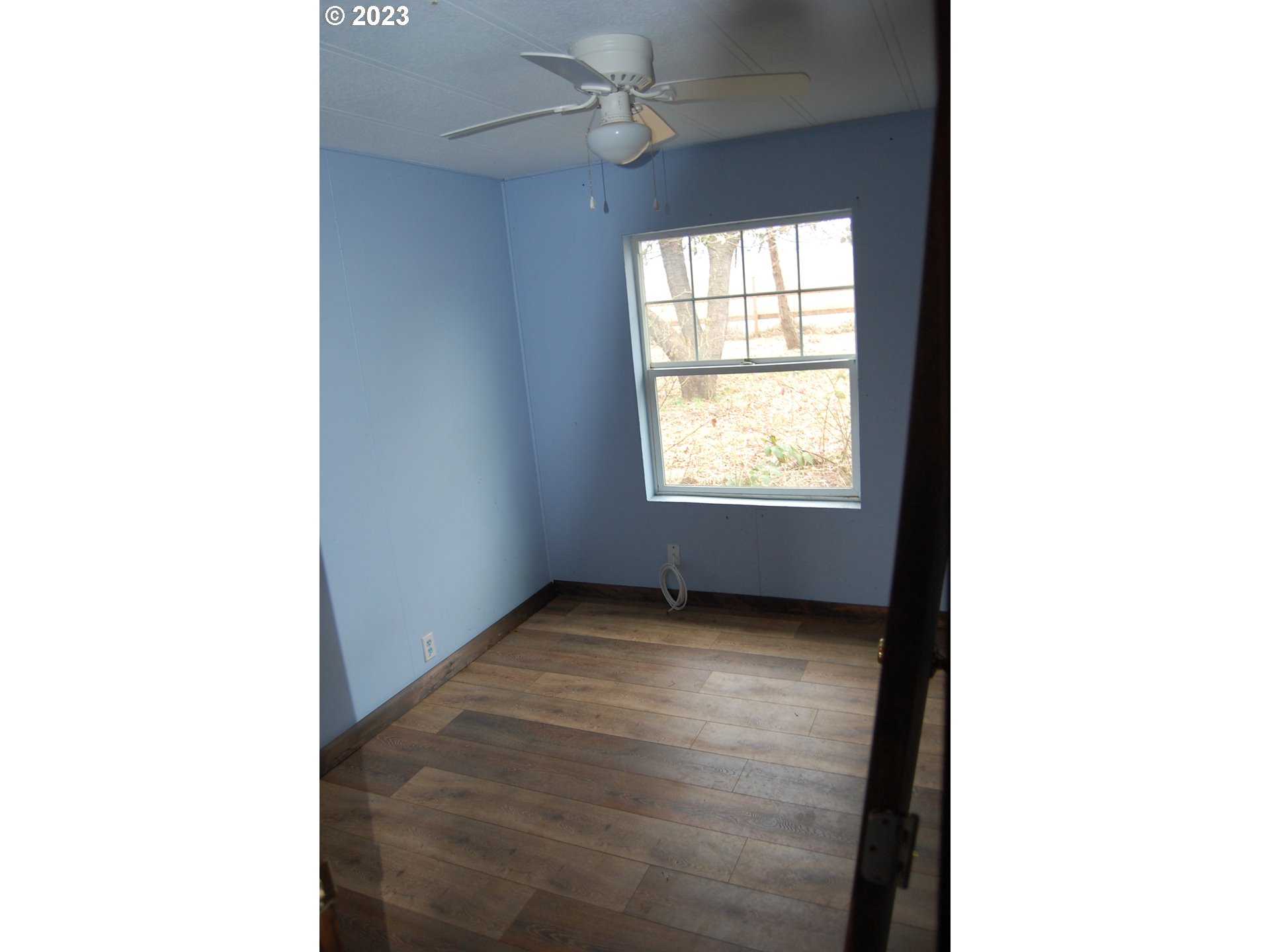 8850 Red Prairie Road Sheridan, OR 97378 - Photo 18 of 26 a view of an empty room with a window