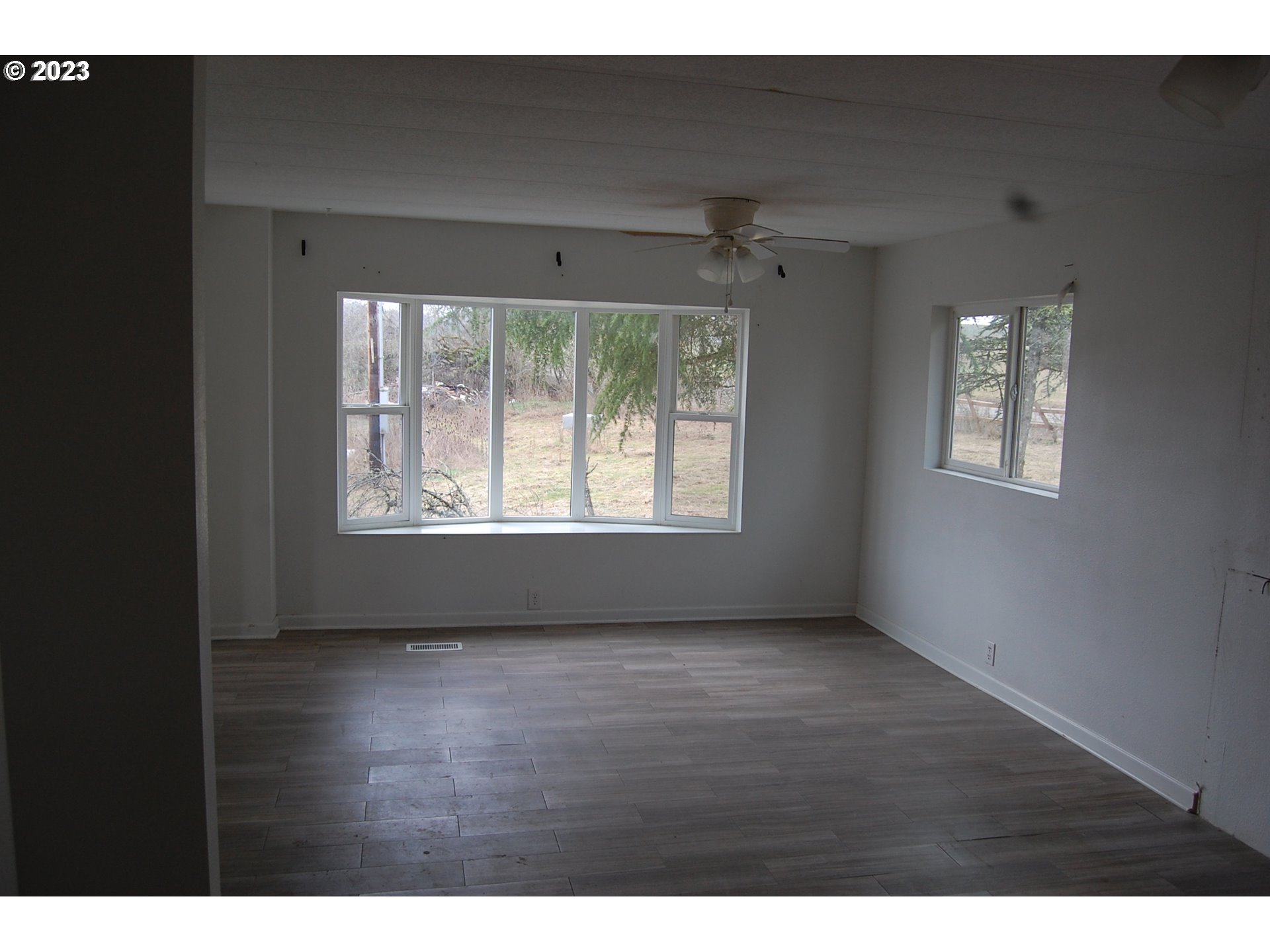 8850 Red Prairie Road Sheridan, OR 97378 - Photo 22 of 26 a view of an empty room with a window