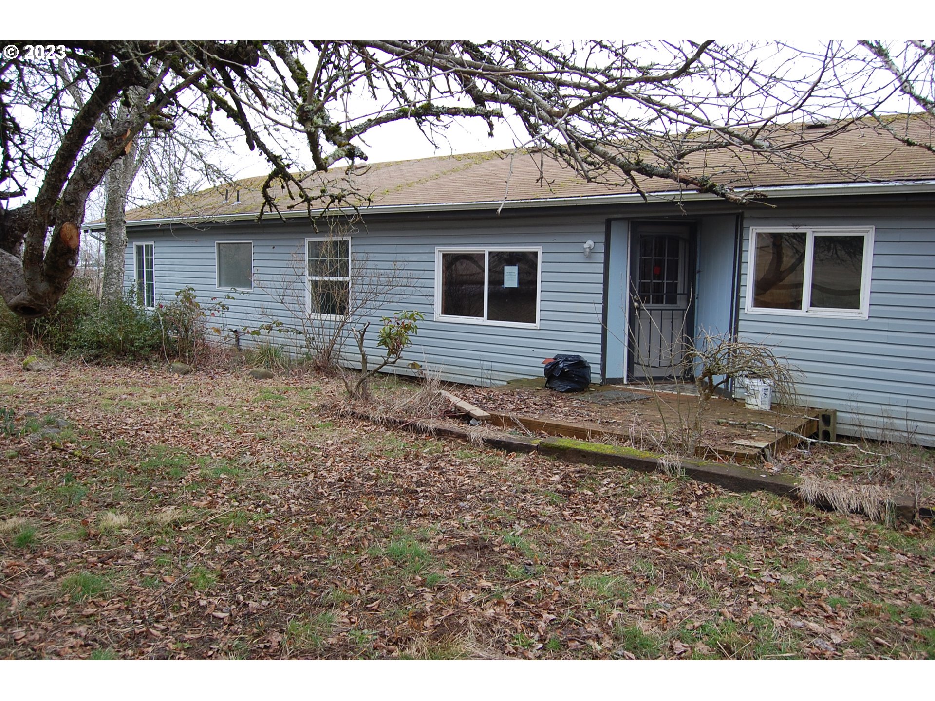 8850 Red Prairie Road Sheridan, OR 97378 - Photo 26 of 26 a view of house with backyard space