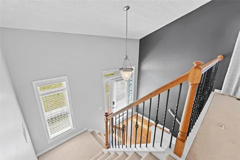 a view of an entryway with stairs