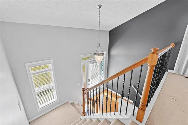 a view of an entryway with stairs