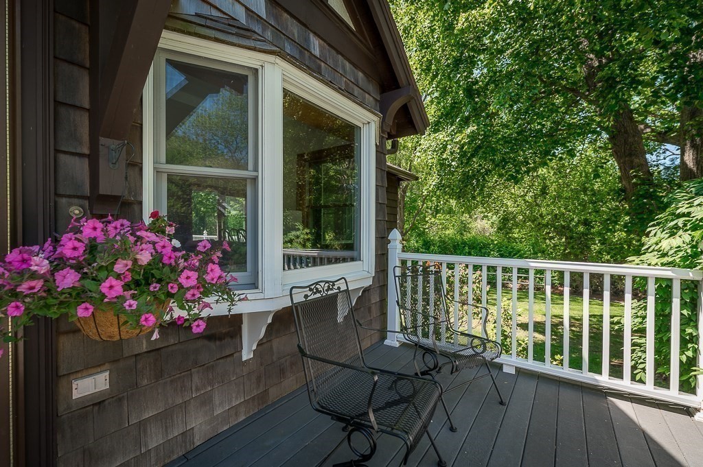 20 R Edgemoor Road Gloucester, MA 01930 - Photo 12 of 33 a view of a two chairs and table in the balcony
