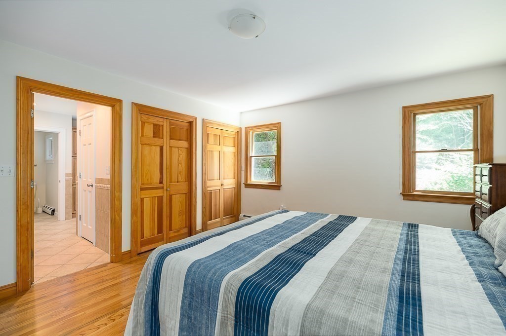 20 R Edgemoor Road Gloucester, MA 01930 - Photo 24 of 33 a bedroom with a bed and a window