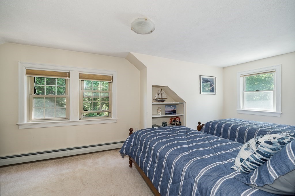 20 R Edgemoor Road Gloucester, MA 01930 - Photo 27 of 33 a bedroom with two beds and a window