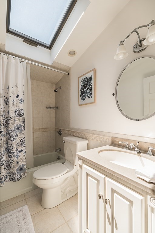 20 R Edgemoor Road Gloucester, MA 01930 - Photo 32 of 33 a white toilet sitting next to a bathroom sink