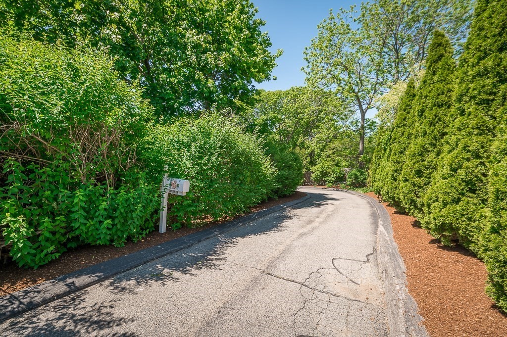 20 R Edgemoor Road Gloucester, MA 01930 - Photo 5 of 33 a view of a pathway both side of yard