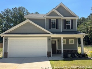 390 Summerhill Road Fayetteville, NC 28303 - Photo 1 of 27 a front view of a house with a yard