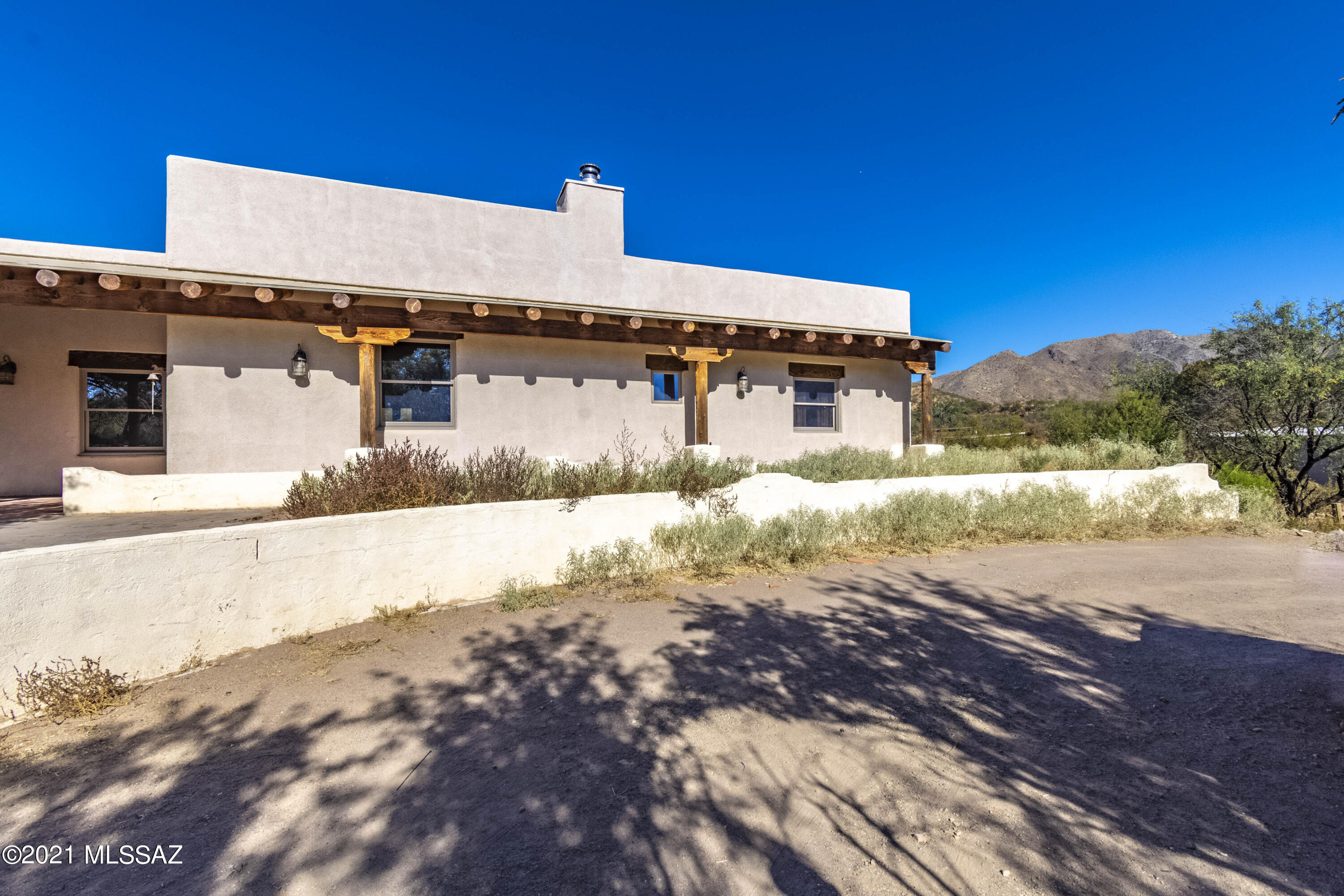 15301 East Hillton Ranch Road Vail, AZ 85641 - Photo 2 of 33 a view of a house with a yard