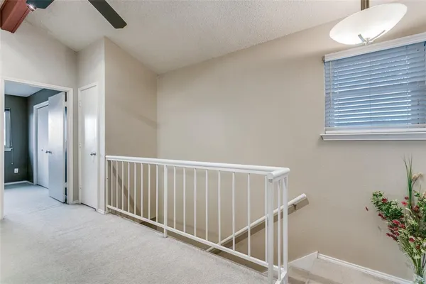a view of a hallway with entryway