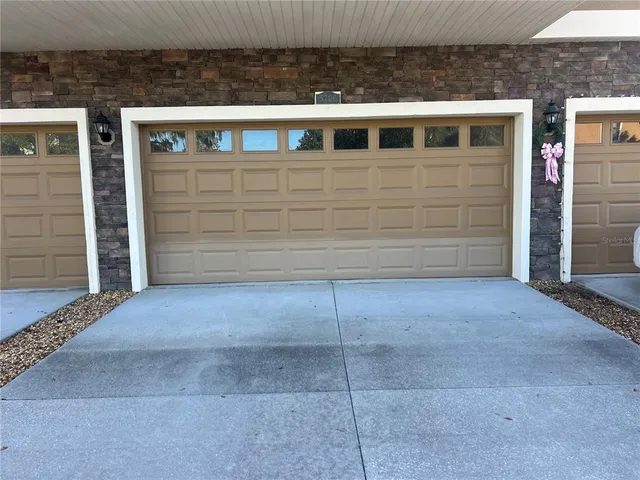 a view of a house with garage