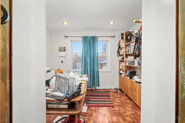 an aerial view of residential houses with outdoor space