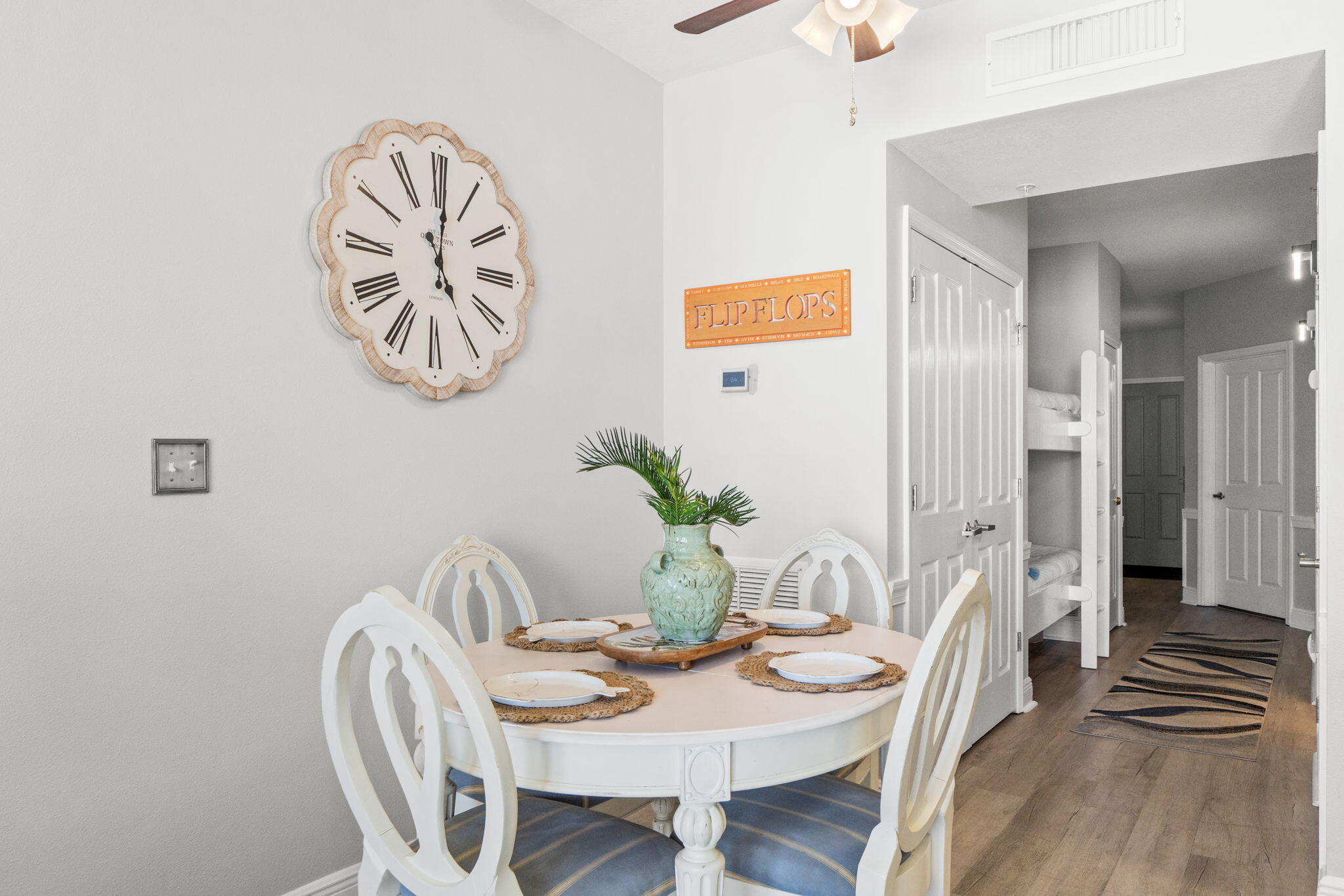 17757 Front Beach Road, Unit 104 Panama City Beach, FL 32413 - Photo 17 of 40 a view of a dining room with furniture