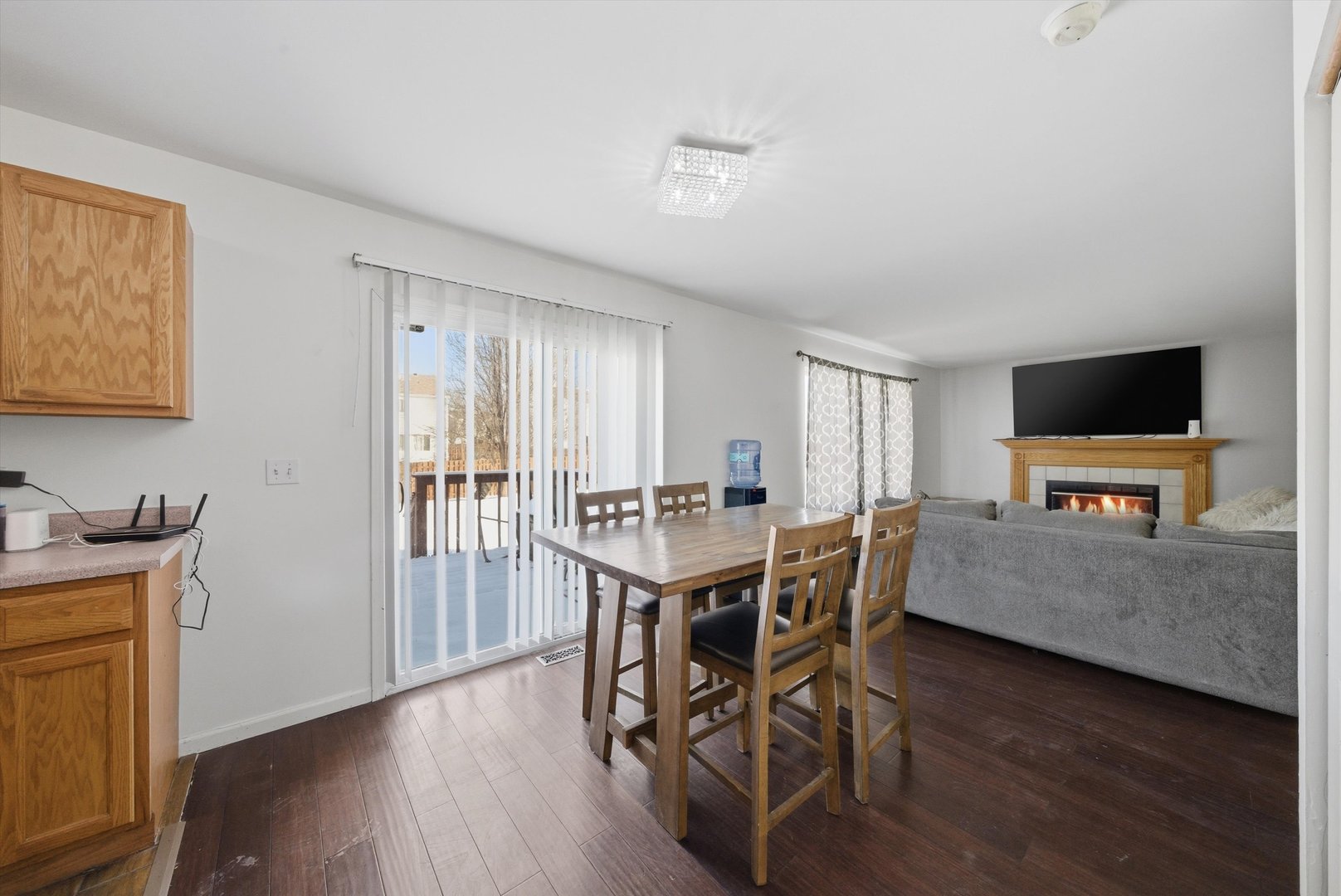 370 Dartmoor Avenue Romeoville, IL 60446 - Photo 15 of 31 a view of a dining room with furniture and wooden floor