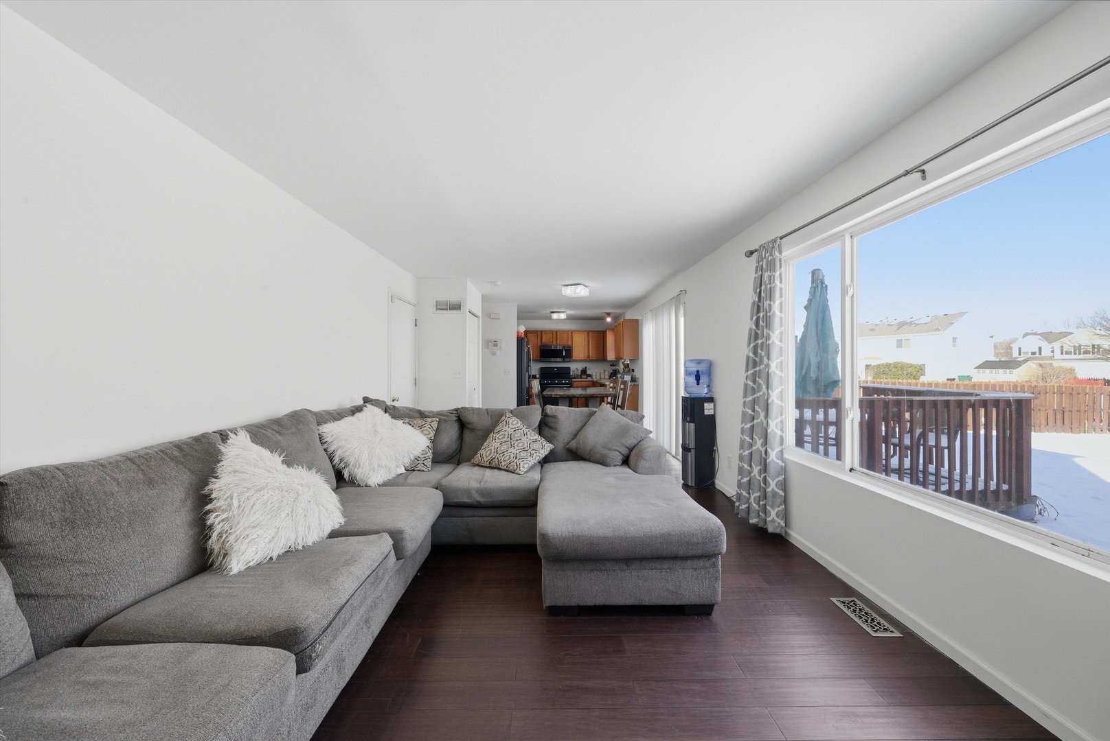 370 Dartmoor Avenue Romeoville, IL 60446 - Photo 18 of 31 a living room with furniture and a wooden floor