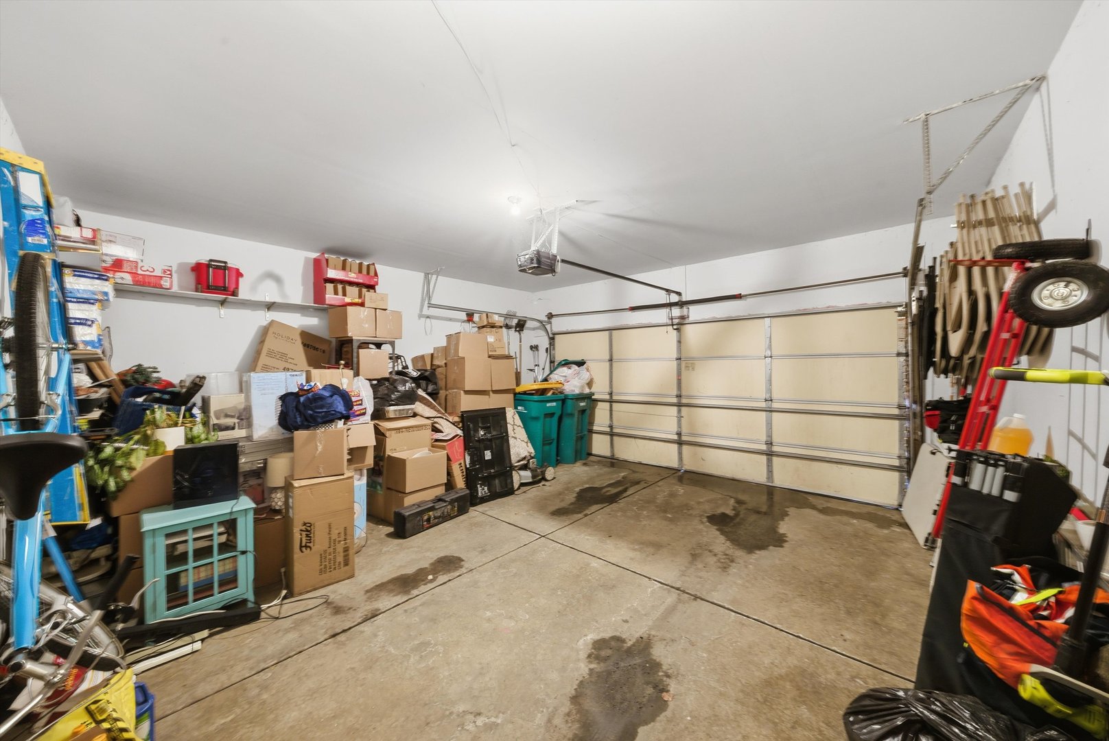 370 Dartmoor Avenue Romeoville, IL 60446 - Photo 19 of 31 a view of a storage room with a lot of stuff