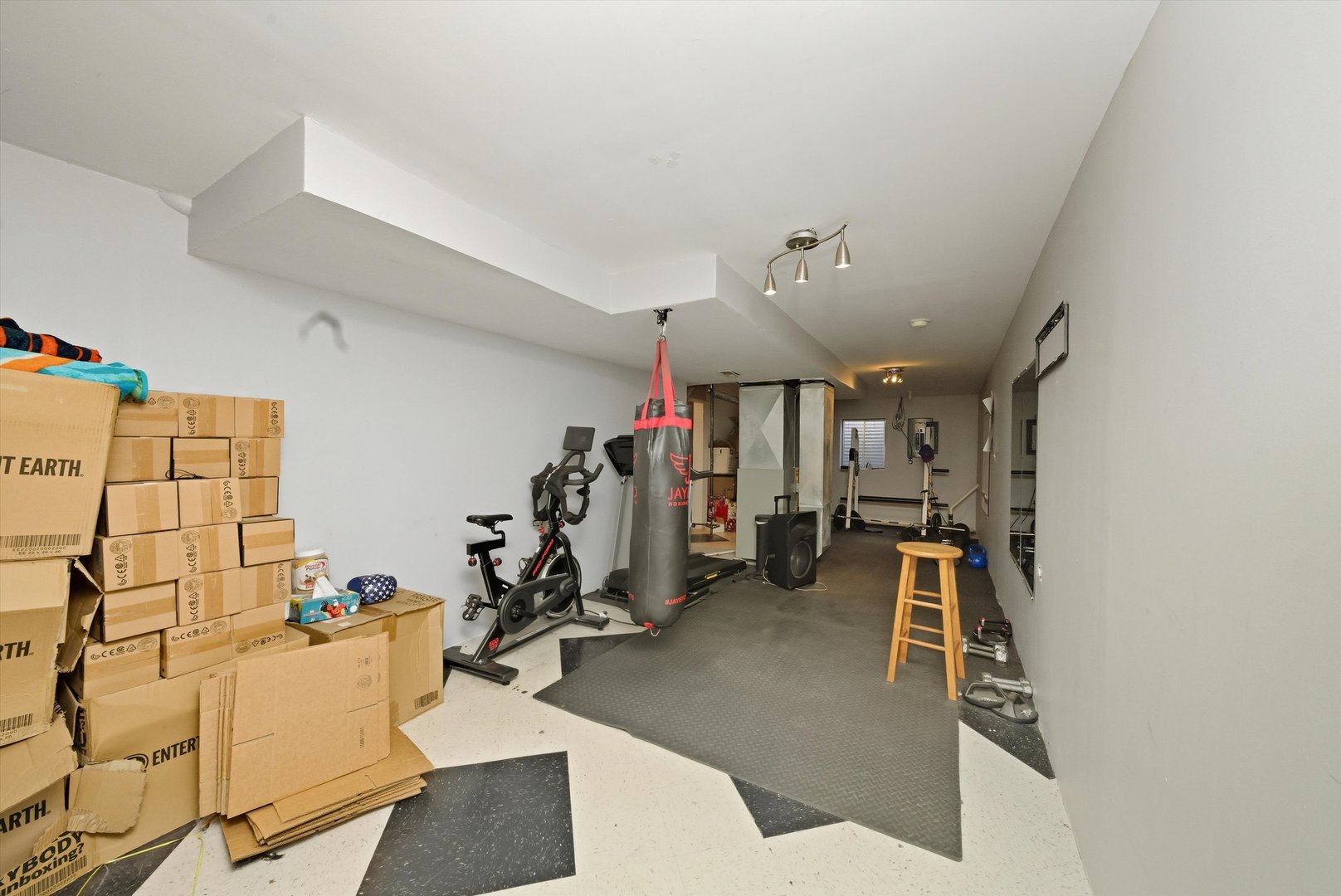 370 Dartmoor Avenue Romeoville, IL 60446 - Photo 20 of 31 a view of a room with gym equipment
