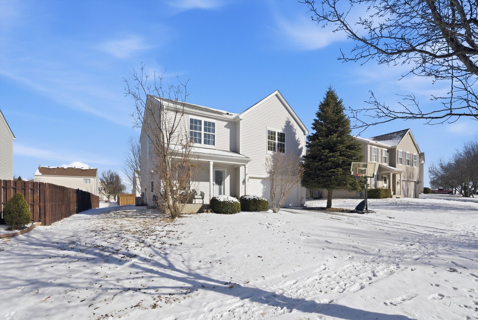 370 Dartmoor Avenue Romeoville, IL 60446 - Photo 2 of 31 a view of a house with a snow in the yard