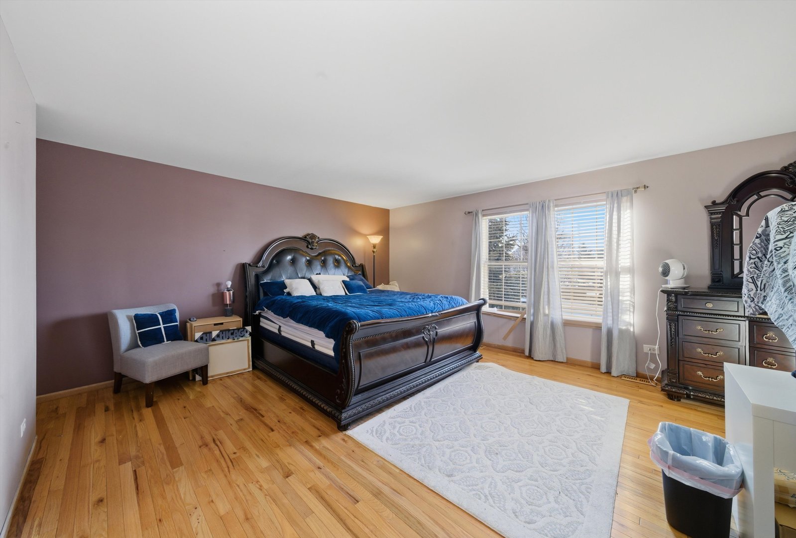 370 Dartmoor Avenue Romeoville, IL 60446 - Photo 21 of 31 a bedroom with furniture and a wooden floor