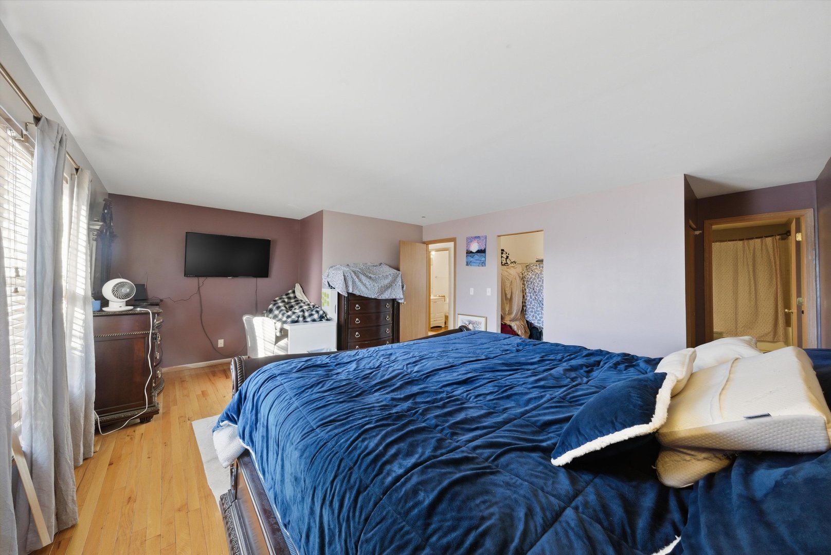 370 Dartmoor Avenue Romeoville, IL 60446 - Photo 22 of 31 a bedroom with a bed and a flat screen tv