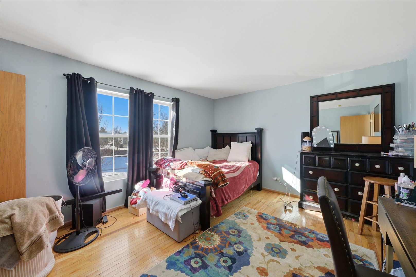 370 Dartmoor Avenue Romeoville, IL 60446 - Photo 26 of 31 a bedroom with bed and wooden floor