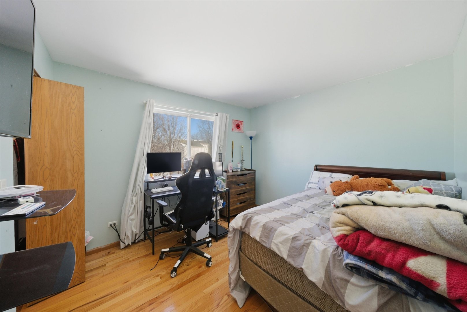 370 Dartmoor Avenue Romeoville, IL 60446 - Photo 27 of 31 a bedroom with a bed and a desk