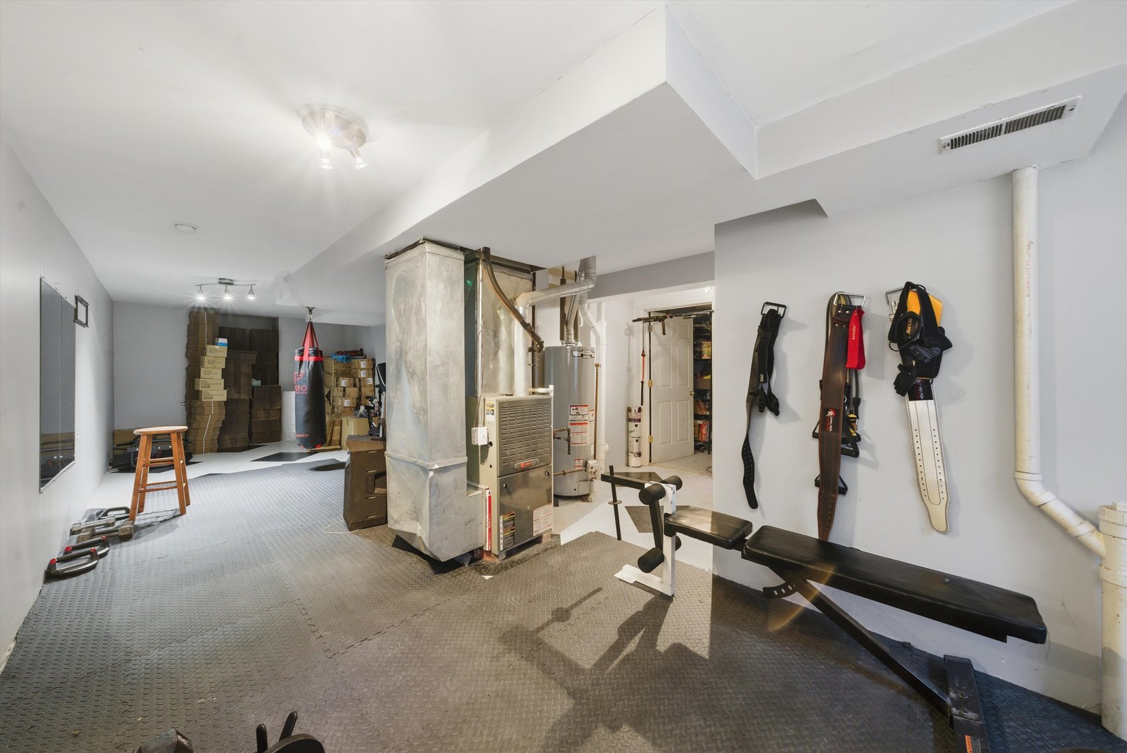 370 Dartmoor Avenue Romeoville, IL 60446 - Photo 30 of 31 a view of a room with gym equipment