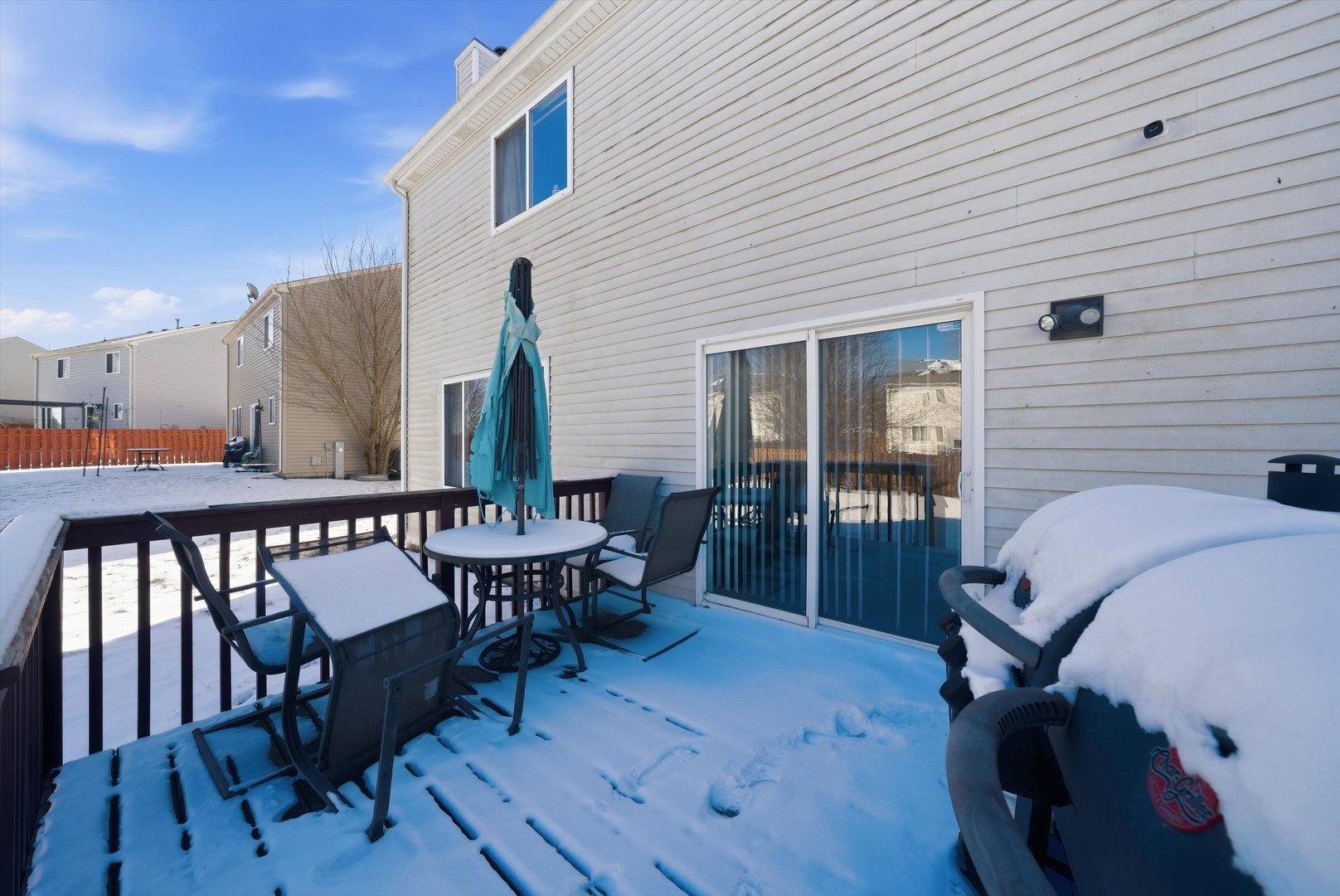 370 Dartmoor Avenue Romeoville, IL 60446 - Photo 3 of 31 a balcony with furniture and wooden floor