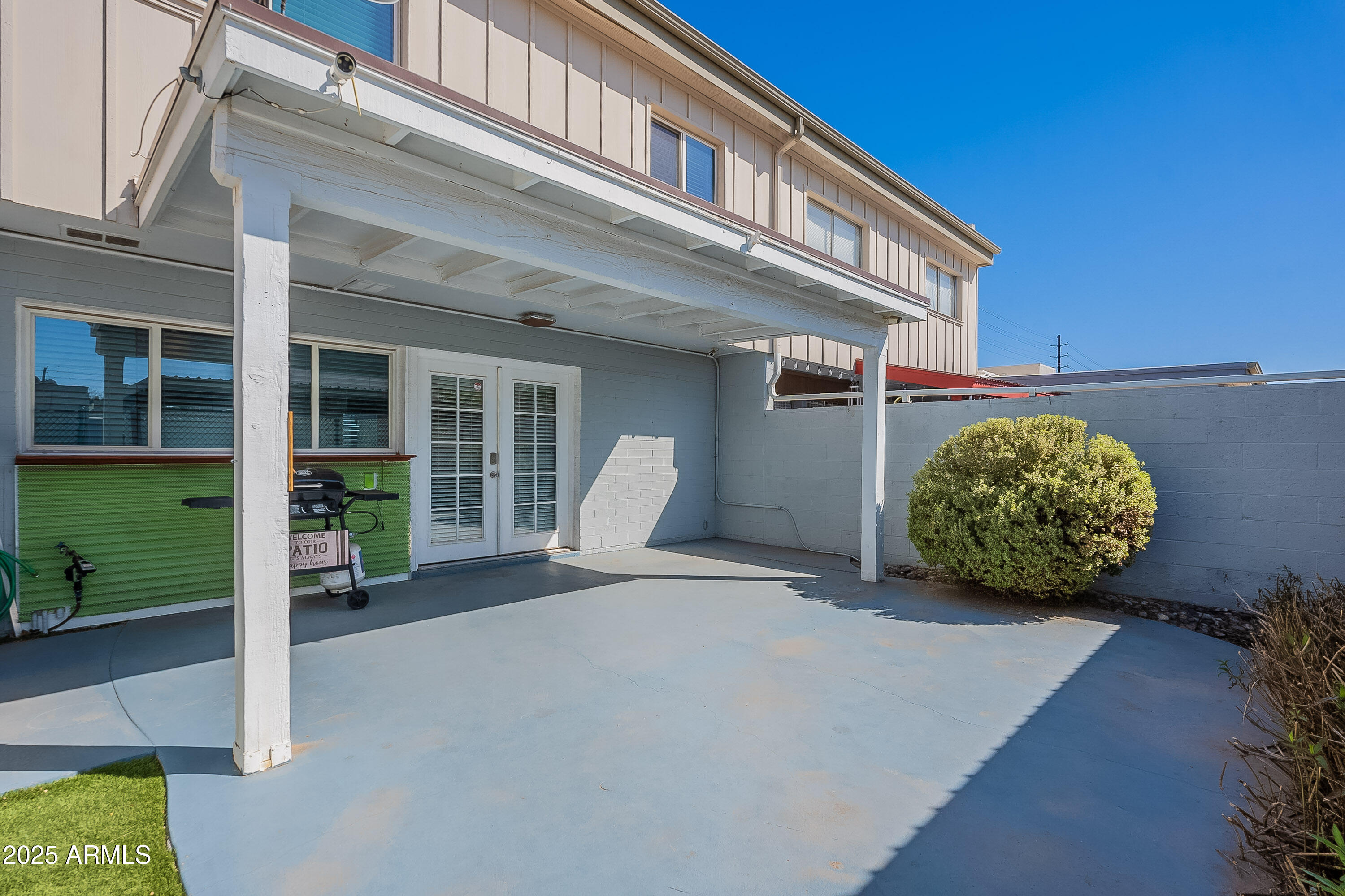 5853 East Thomas Road Scottsdale, AZ 85251 - Photo 14 of 18 a house view with a outdoor space