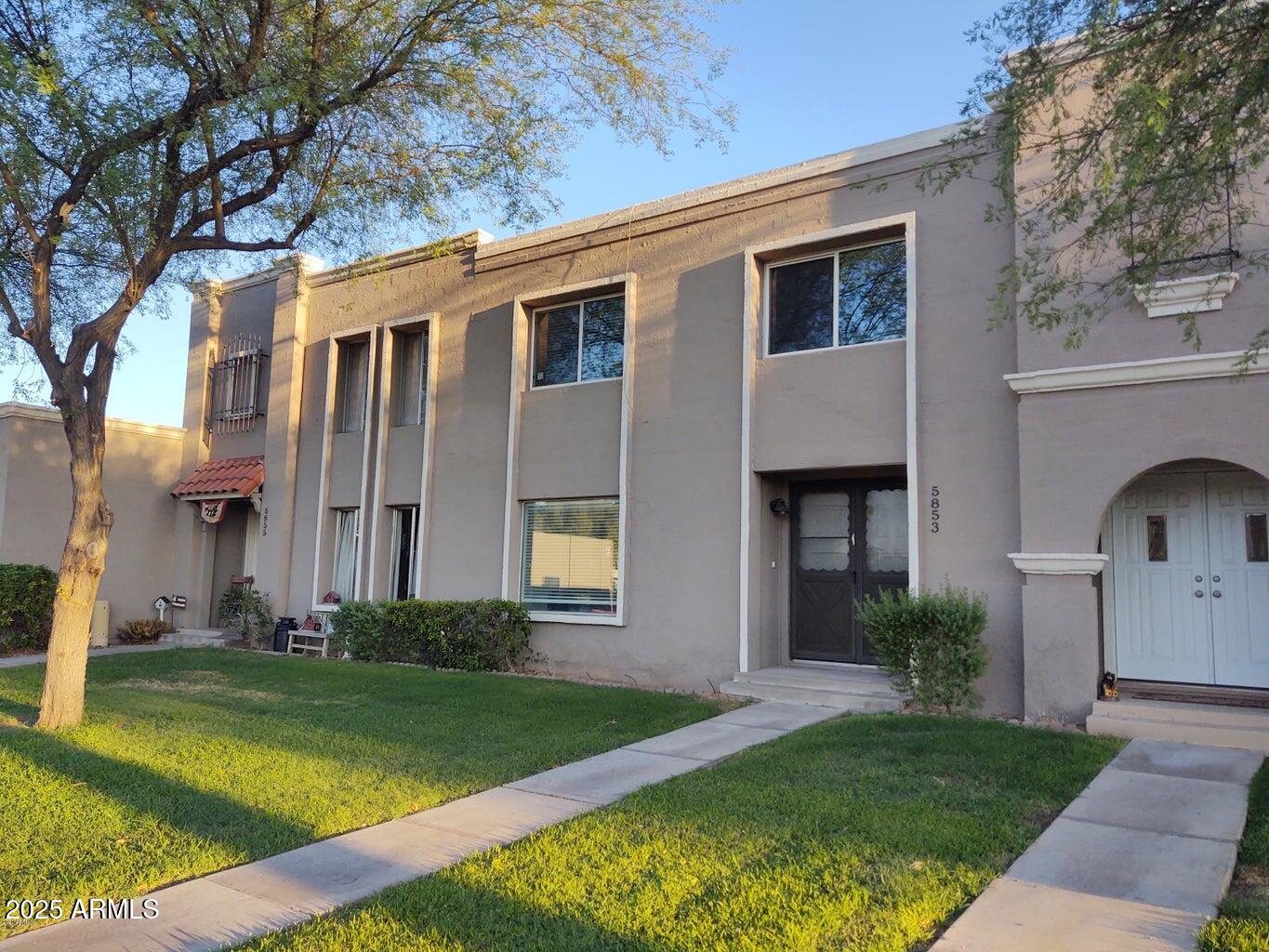 5853 East Thomas Road Scottsdale, AZ 85251 - Photo 15 of 18 a view of a yard in front of a house