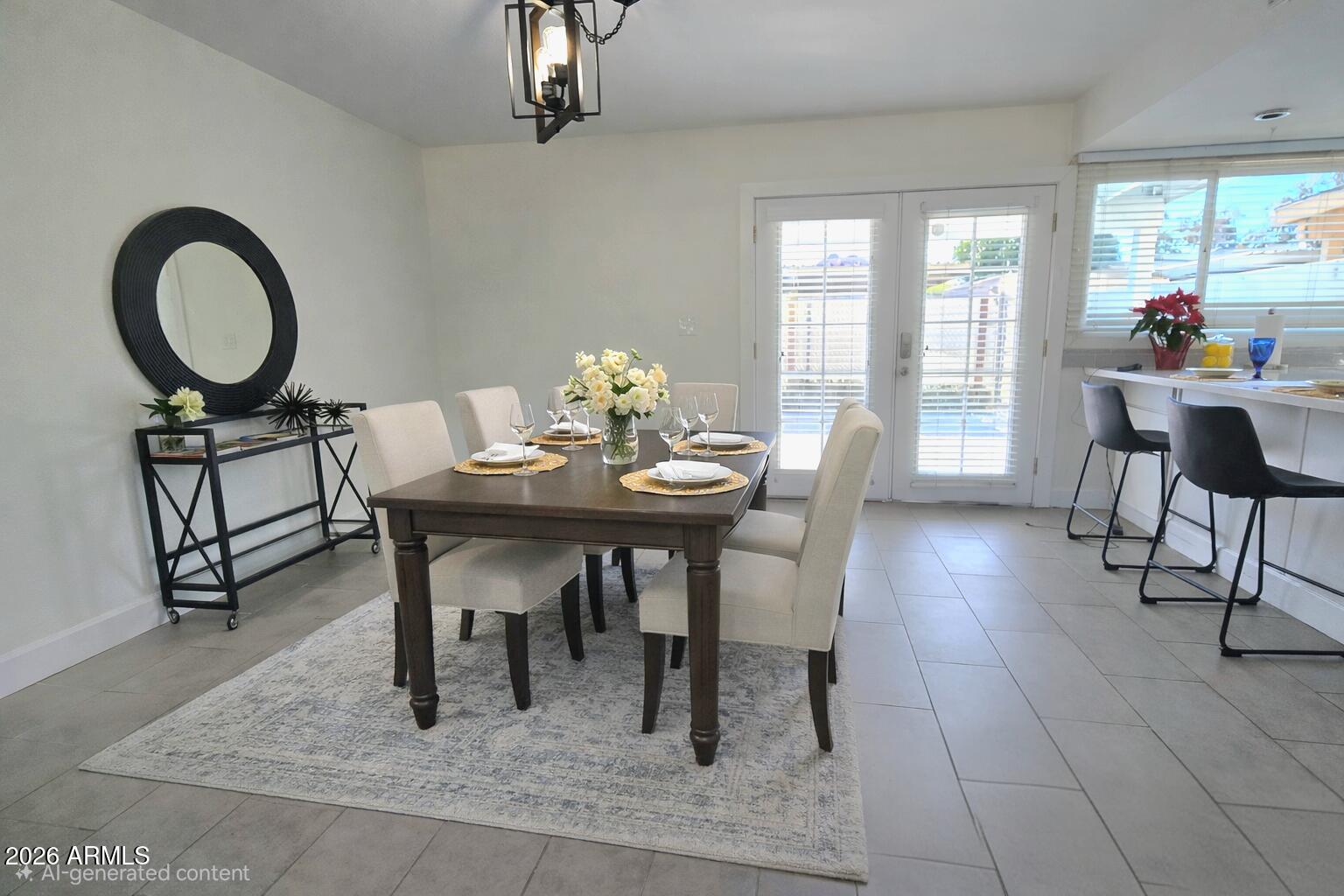 5853 East Thomas Road Scottsdale, AZ 85251 - Photo 2 of 18 a dining room with furniture and a floor to ceiling window