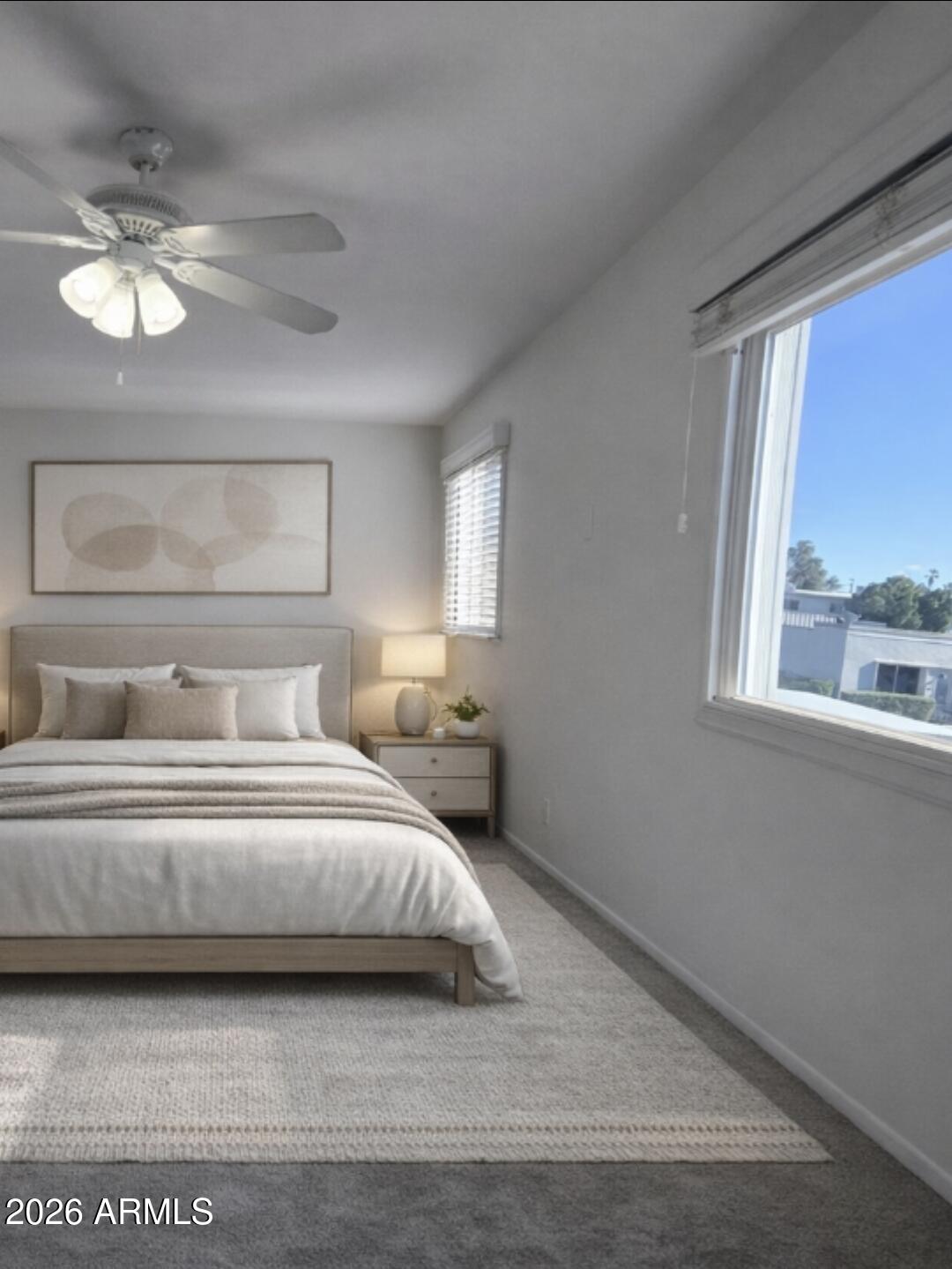 5853 East Thomas Road Scottsdale, AZ 85251 - Photo 7 of 18 a bedroom with a bed and a large window