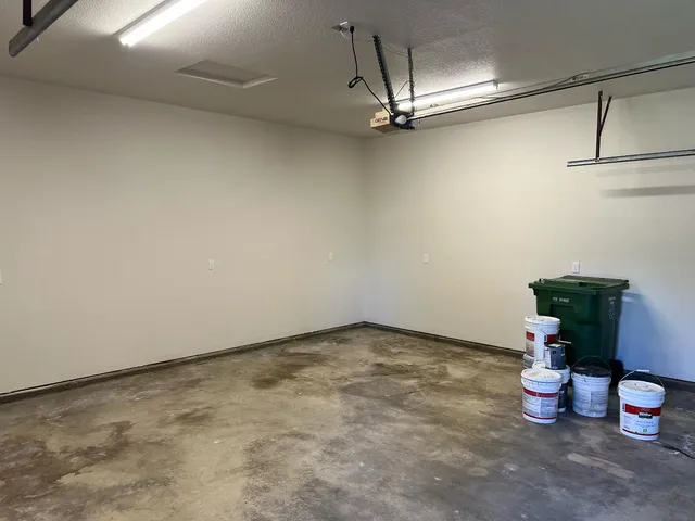 a view of a room with wooden floor and chair