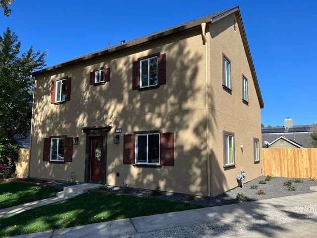 a street sign on the side of a road