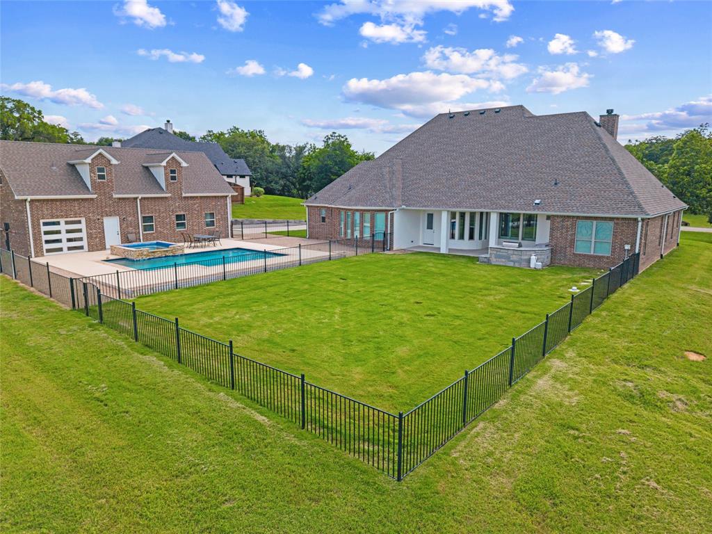 318 Arapahoe Ridge Weatherford, TX 76087 - Photo 39 of 40 Yard and pool are separately fenced