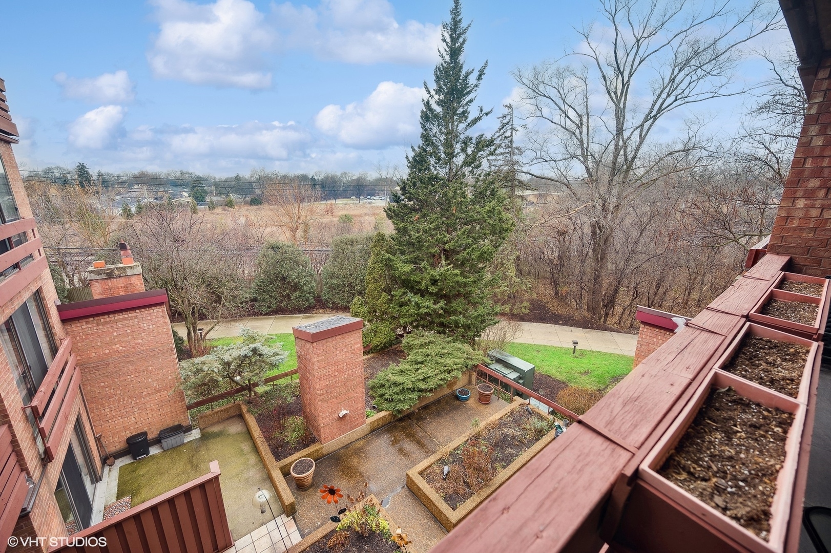 710 Waukegan Road, Unit 303 Glenview, IL 60025 - Photo 8 of 15 an aerial view of a house with a garden and lake view
