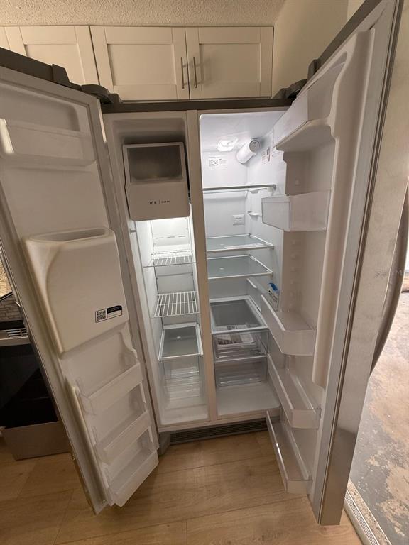7808 Talisman Drive Port Richey, FL 34668 - Photo 6 of 20 a view of walk in closet with an empty space