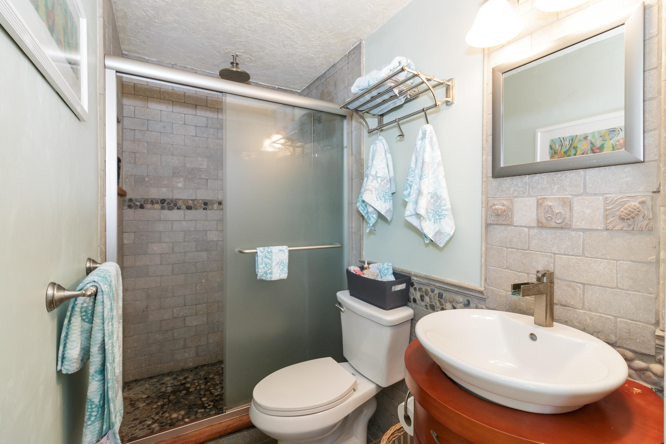 40 Frederick Road Falmouth, MA 02540 - Photo 11 of 19 a bathroom with a toilet a sink and shower
