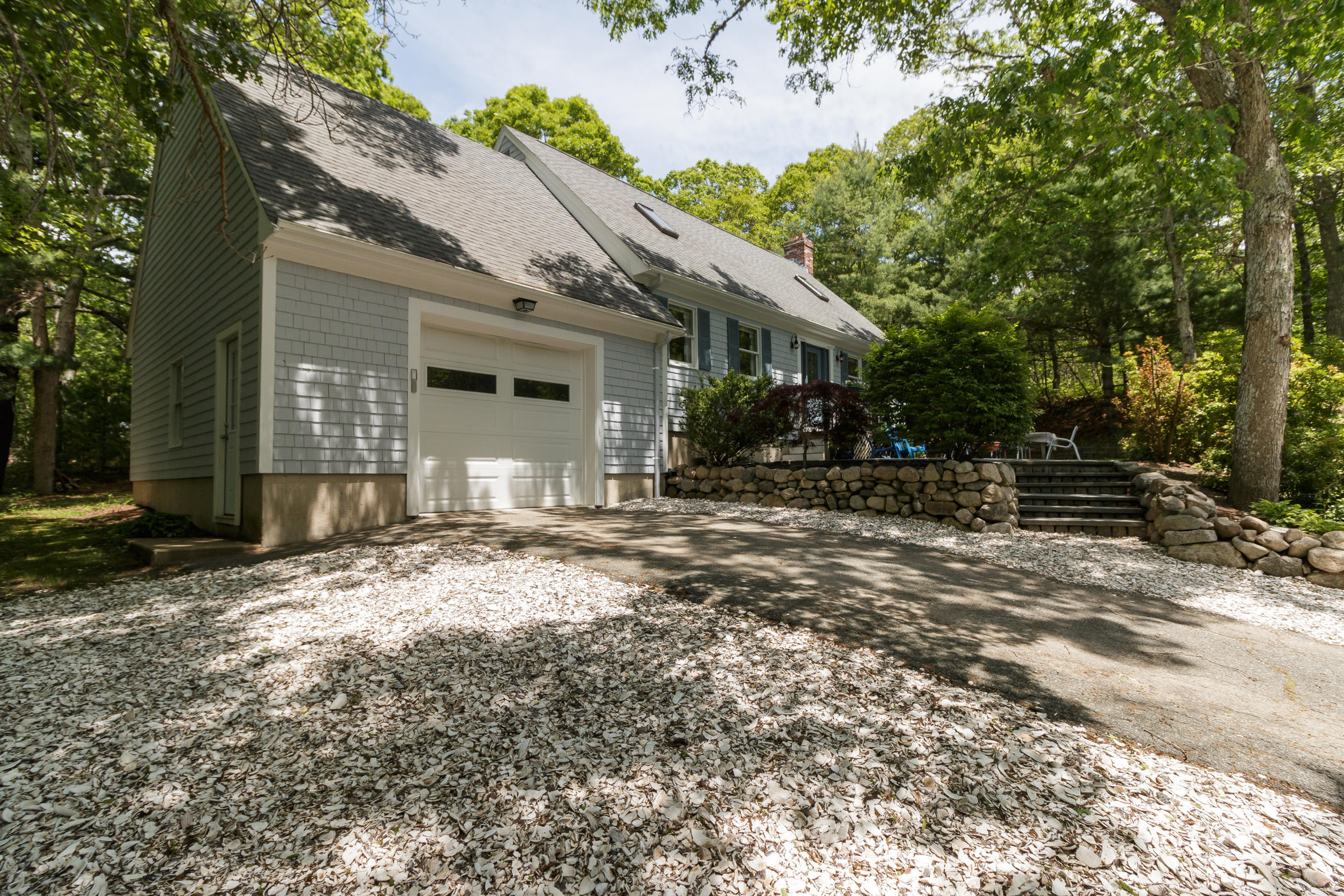 40 Frederick Road Falmouth, MA 02540 - Photo 18 of 19 a front view of a house with a yard