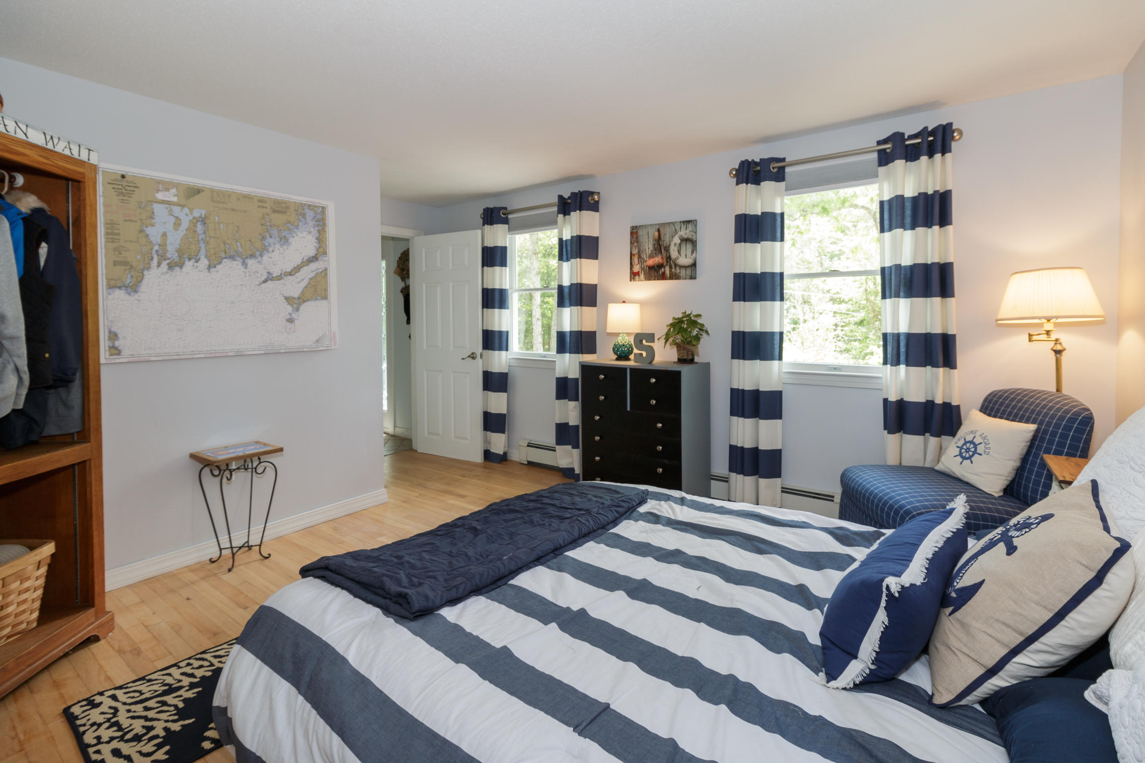 40 Frederick Road Falmouth, MA 02540 - Photo 10 of 19 a bedroom with furniture and a flat screen tv