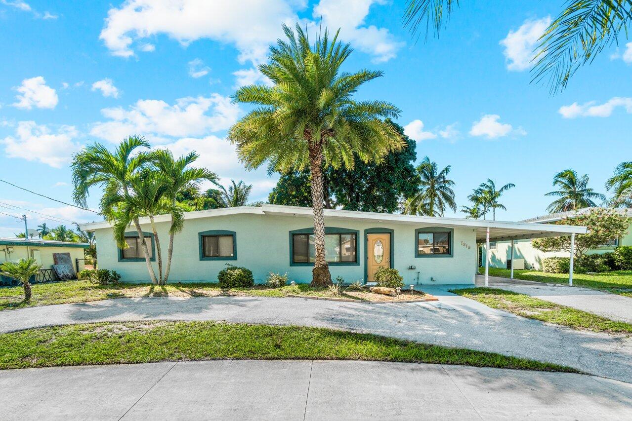 1815 High Ridge Road Lake Worth, FL 33461 - Photo 1 of 29 FRONT