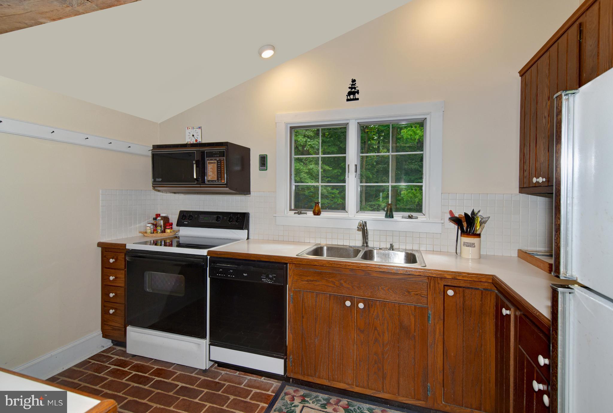 15 Oldfield Point Road Elkton, MD 21921 - Photo 6 of 24 Beautiful wood cabinets, sink window with a view!