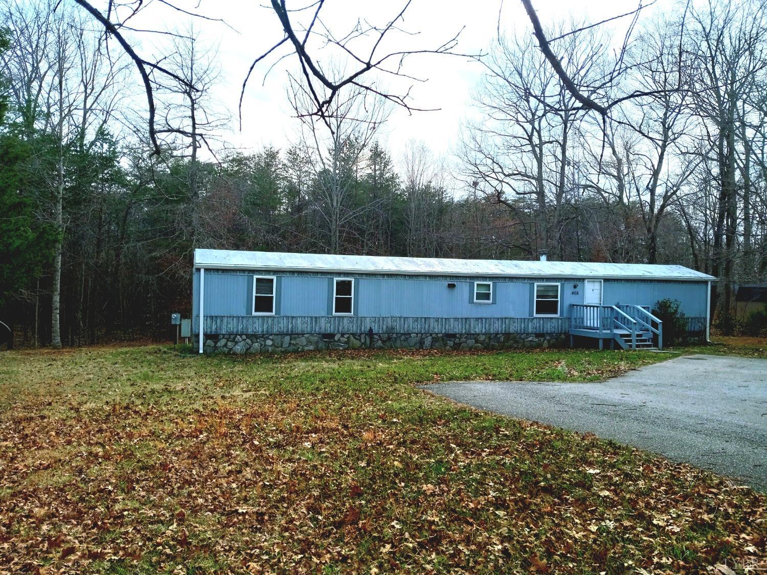468 Hawkins Road Evington, VA 24550 - Photo 1 of 31 a view of a house with a yard