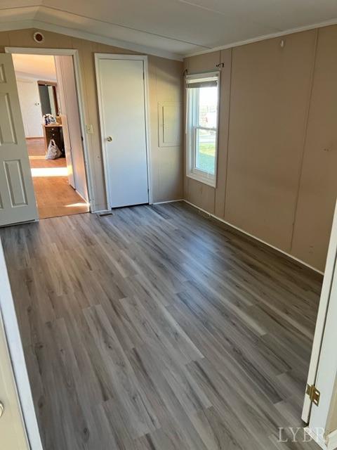 468 Hawkins Road Evington, VA 24550 - Photo 11 of 31 wooden floor in an empty room with a window