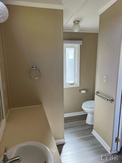 468 Hawkins Road Evington, VA 24550 - Photo 12 of 31 a bathroom with a toilet and a sink