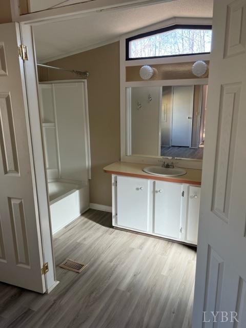 468 Hawkins Road Evington, VA 24550 - Photo 13 of 31 a view of a hallway with wooden floor and cabinet