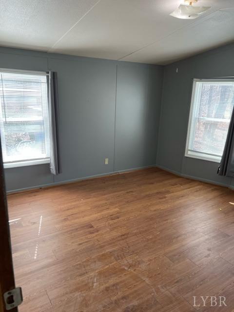 468 Hawkins Road Evington, VA 24550 - Photo 18 of 31 an empty room with windows