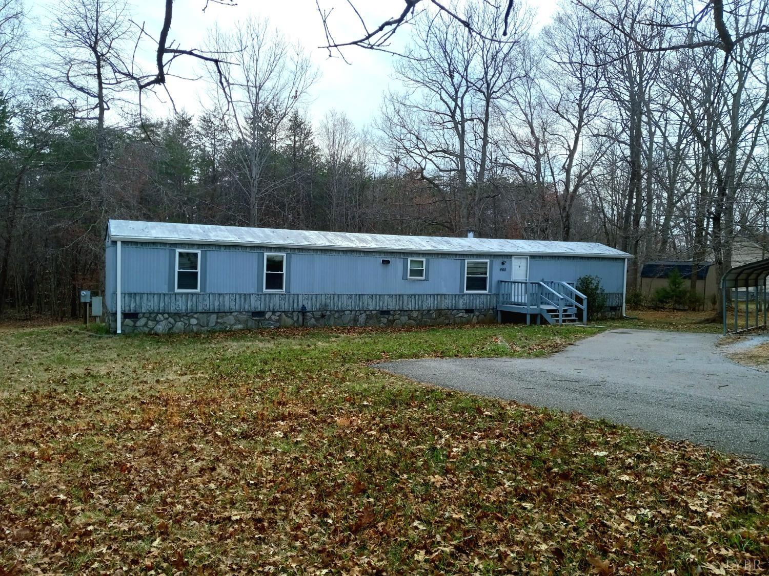 468 Hawkins Road Evington, VA 24550 - Photo 2 of 31 a view of a house with a yard